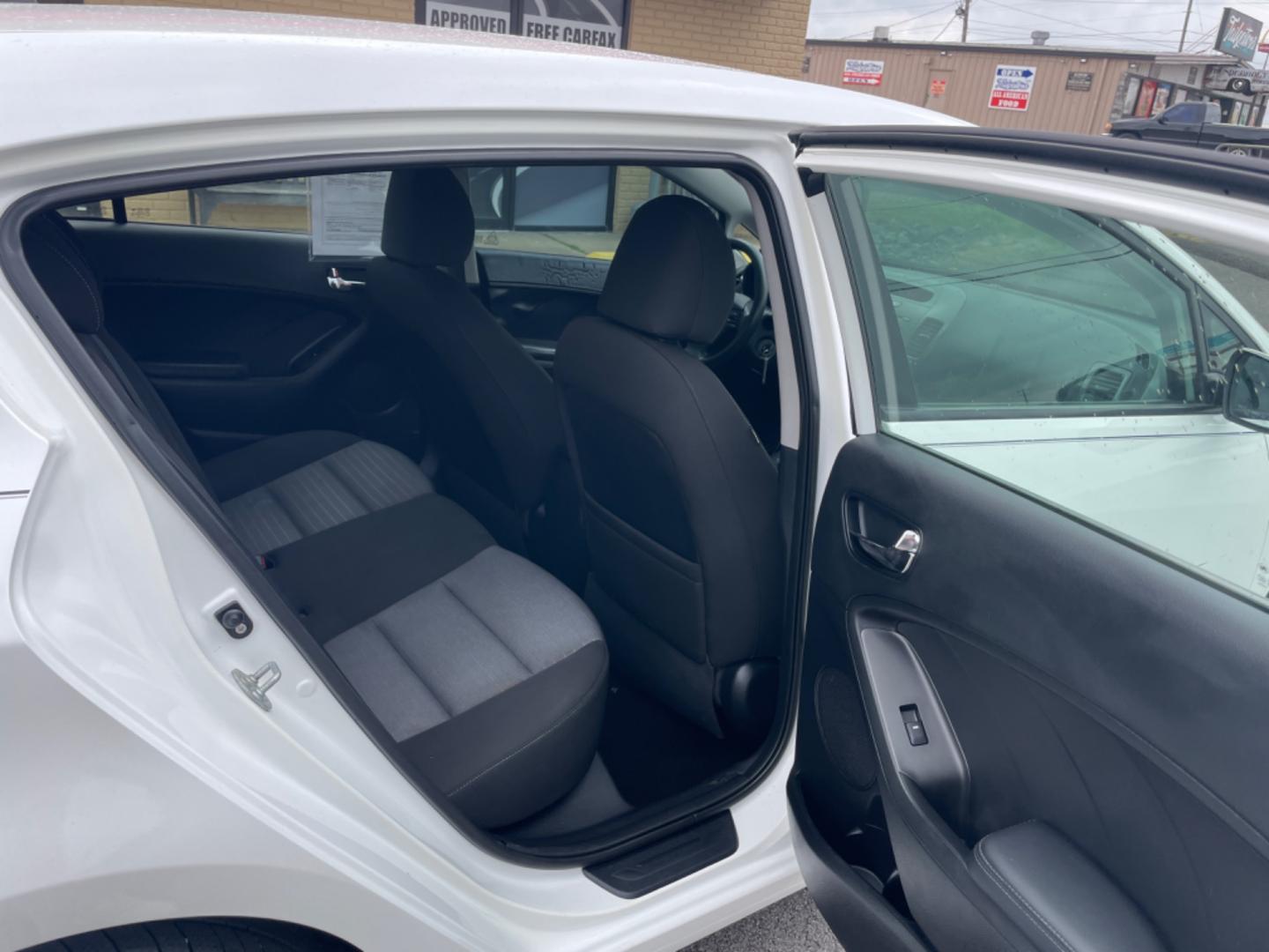 2016 White Kia Forte5 (KNAFK5A86G5) with an 4-Cyl, GDI, 2.0 Liter engine, Auto, 6-Spd w/Sportmatic and Active ECO System transmission, located at 8008 Warden Rd, Sherwood, AR, 72120, (501) 801-6100, 34.830078, -92.186684 - Photo#9